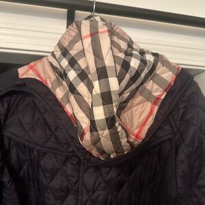 Burberry jacket size medium. Worn only a few times, perfect condition.